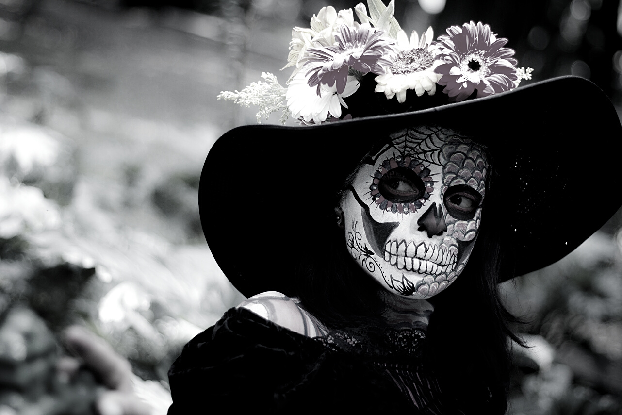 Woman Wearing Make-up For Day of the Dead